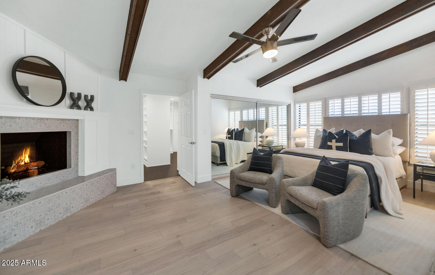 4642 North 31st Street Phoenix, AZ 85016 - Photo 4 of 50 a living room with furniture a fireplace and a large window