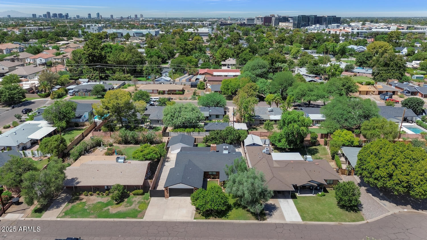 4642 North 31st Street Phoenix, AZ 85016 - Photo 42 of 50 an aerial view of a city with lots of residential buildings