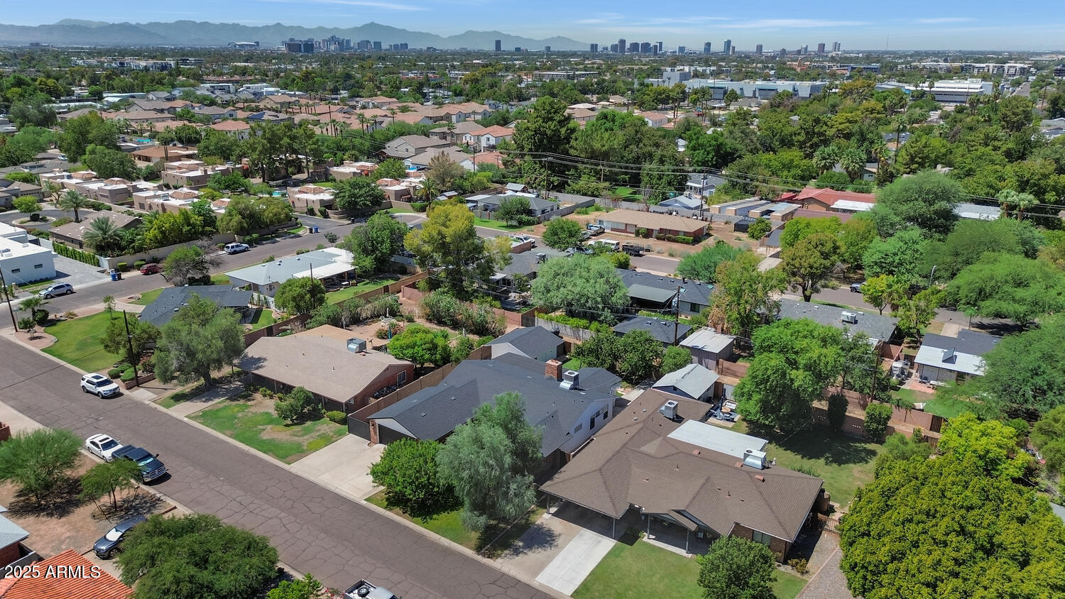 4642 North 31st Street Phoenix, AZ 85016 - Photo 44 of 50 an aerial view of multiple houses with a yard