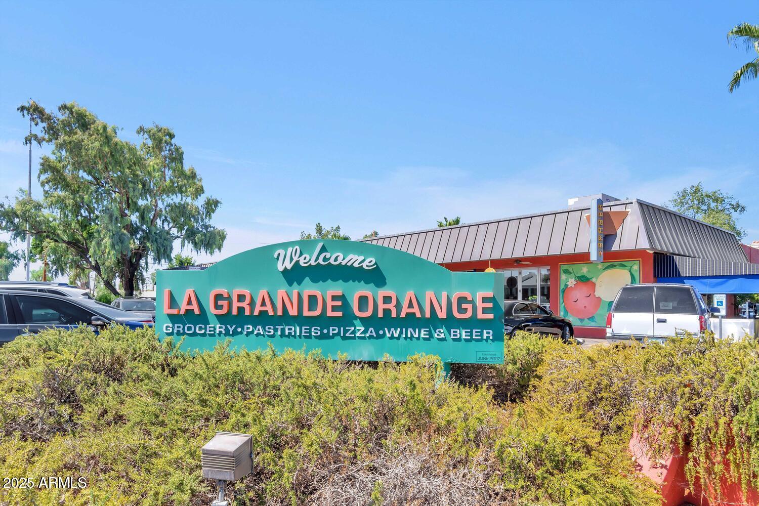 4642 North 31st Street Phoenix, AZ 85016 - Photo 48 of 50 a view of a swimming pool with lawn chairs and a yard
