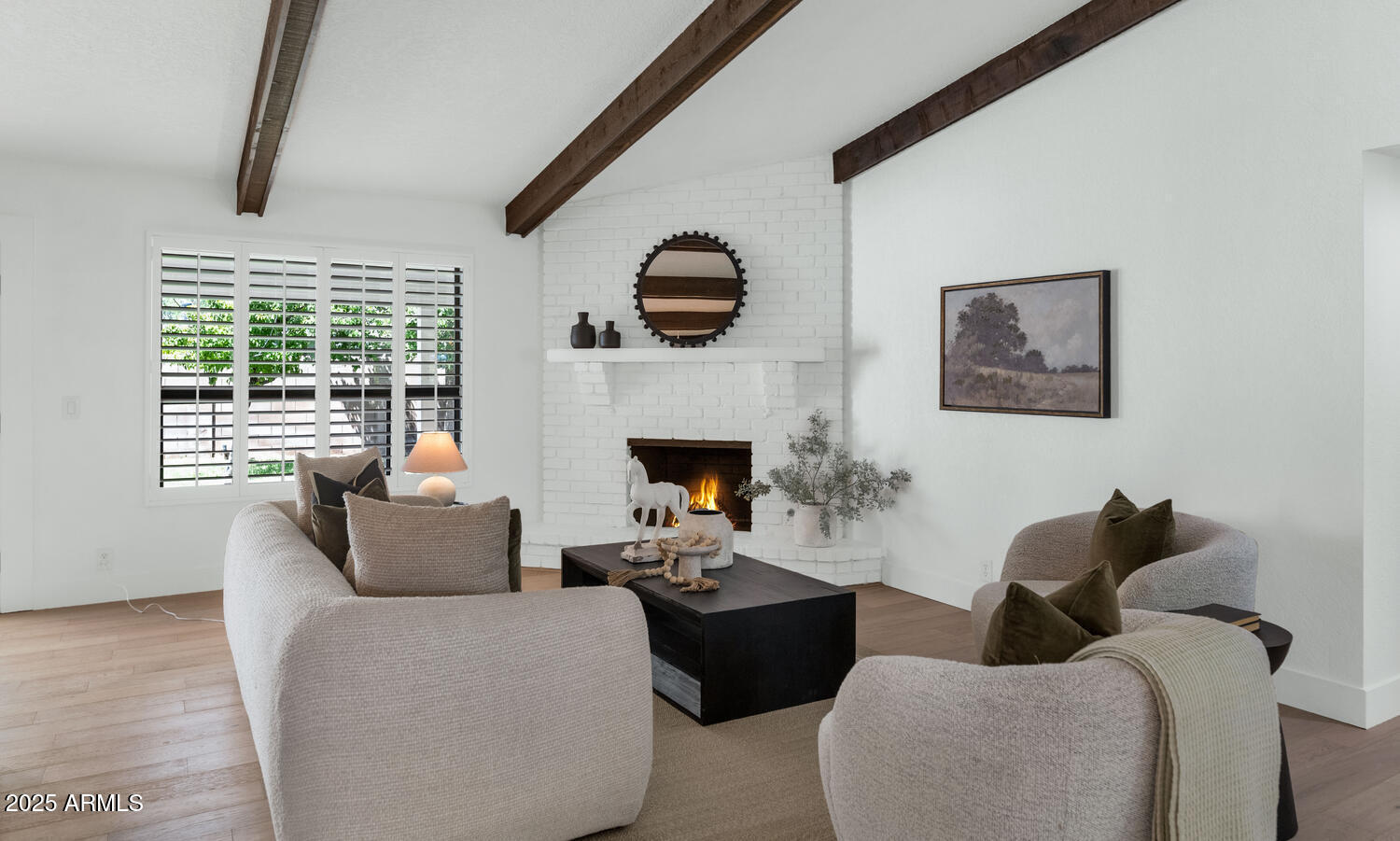 4642 North 31st Street Phoenix, AZ 85016 - Photo 5 of 50 a living room with furniture and a fireplace