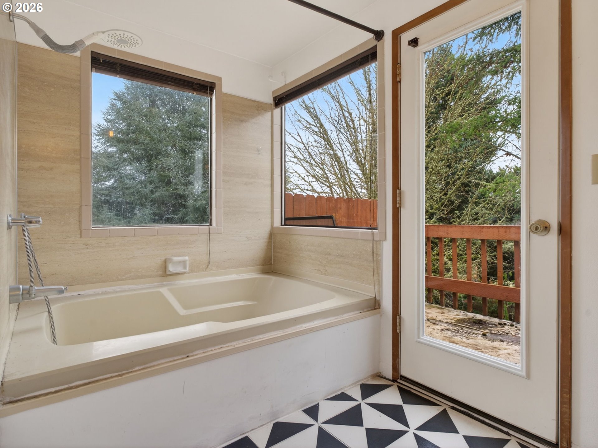6805 Southwest 180th Avenue Beaverton, OR 97007 - Photo 16 of 29 a bathroom with a bathtub and a shower