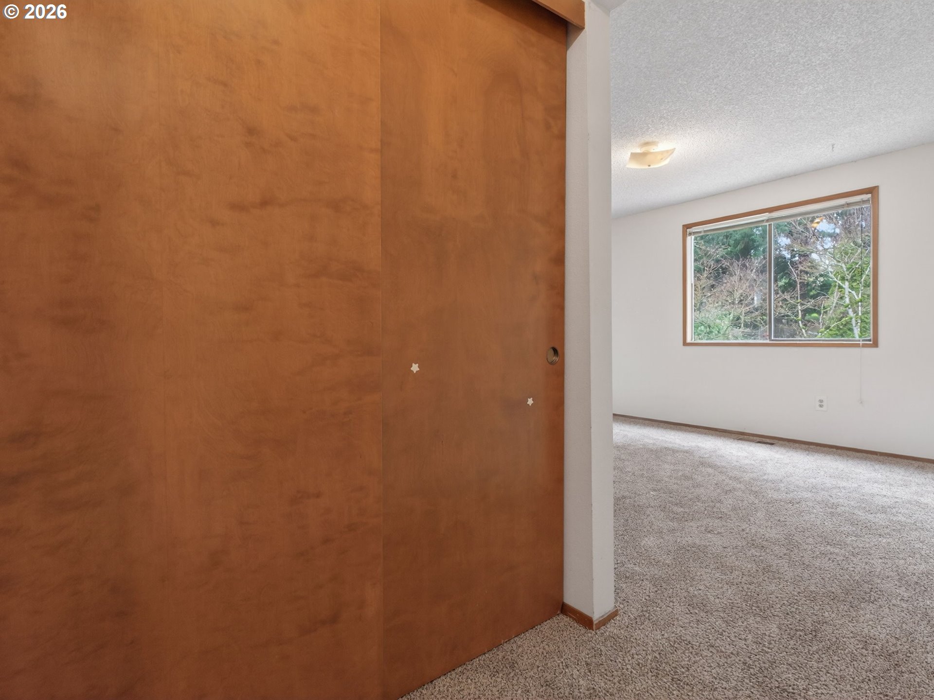 6805 Southwest 180th Avenue Beaverton, OR 97007 - Photo 19 of 29 an empty room with windows