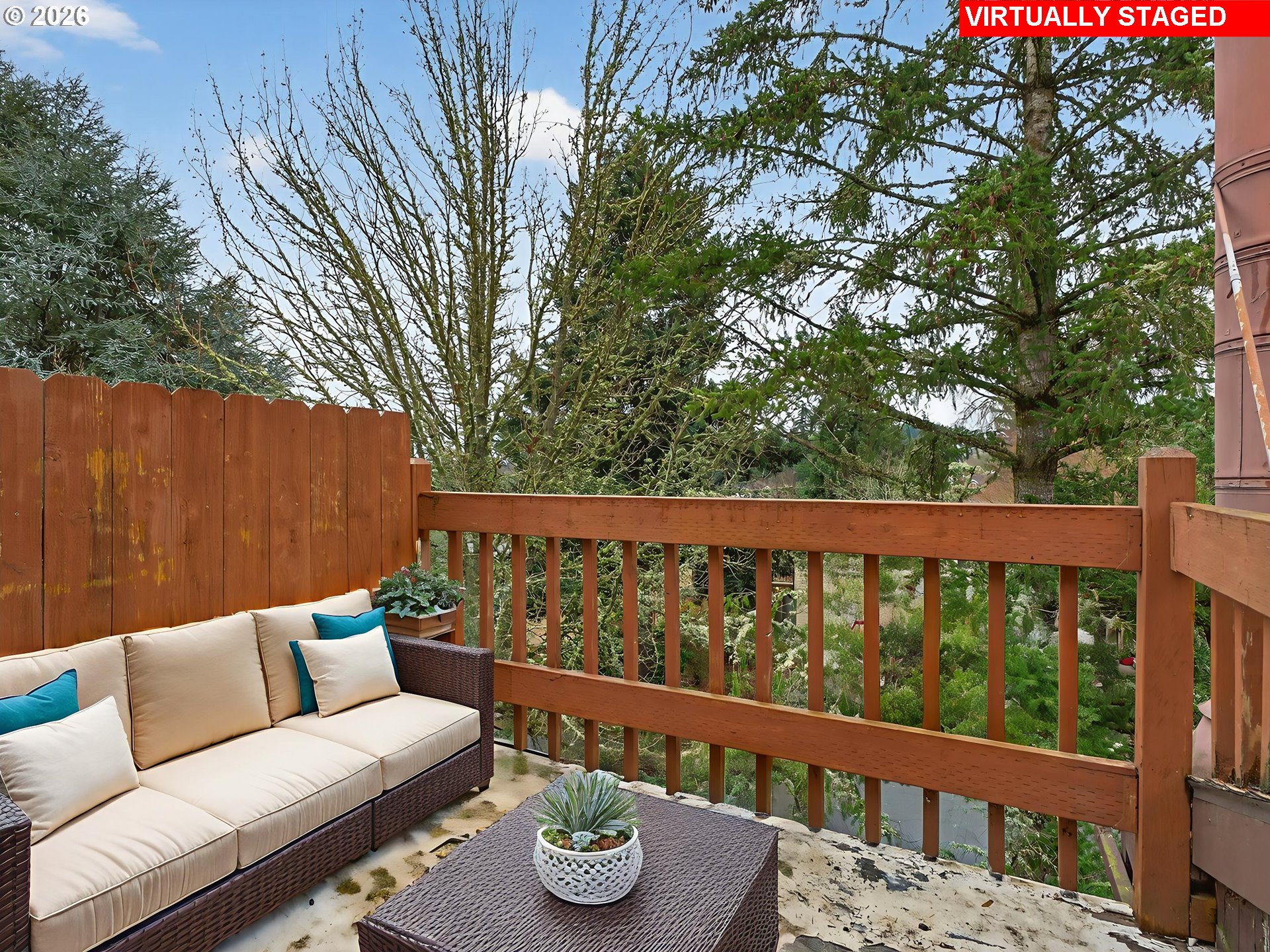 6805 Southwest 180th Avenue Beaverton, OR 97007 - Photo 24 of 29 a balcony with wooden floor and fence