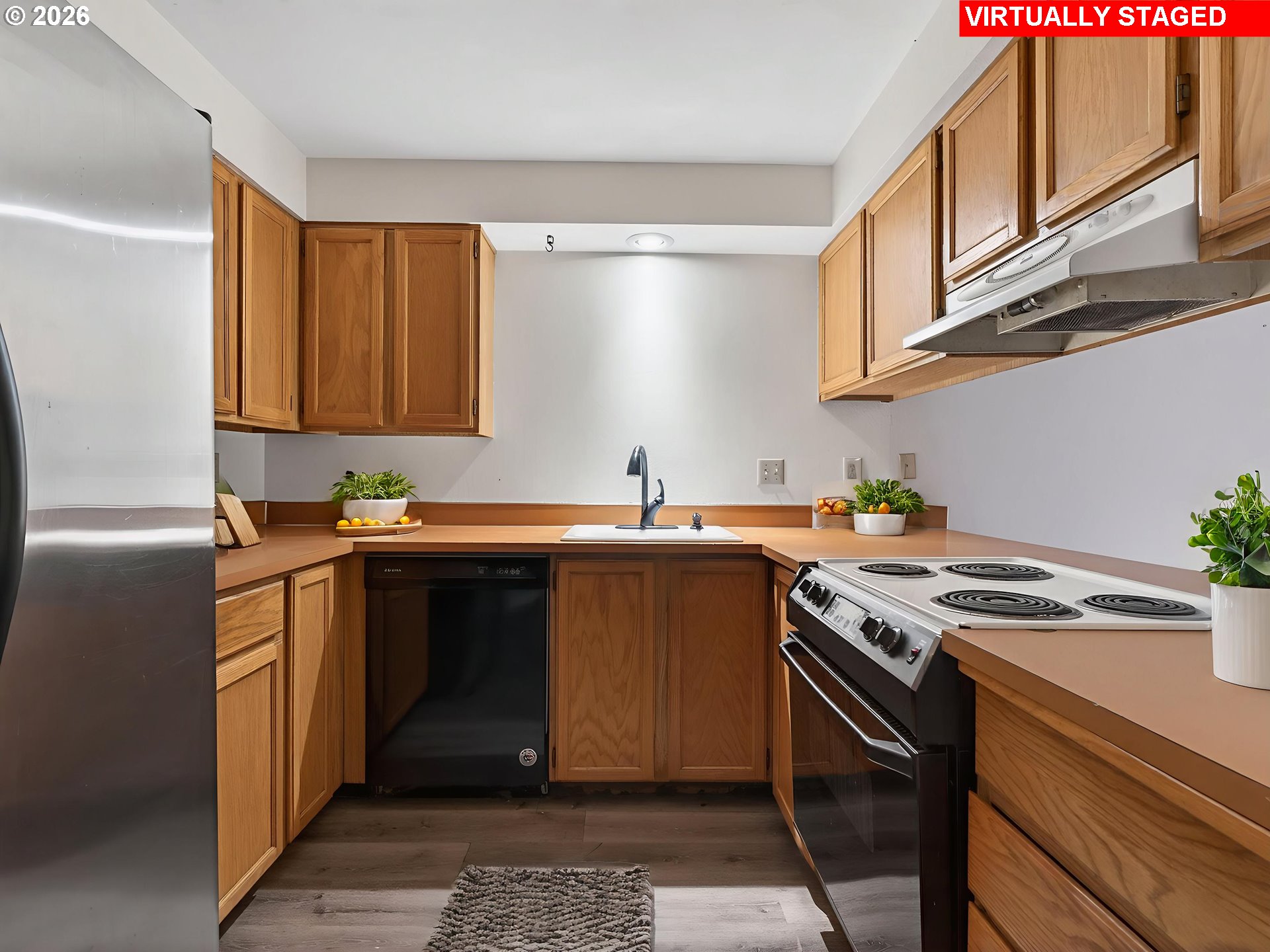 6805 Southwest 180th Avenue Beaverton, OR 97007 - Photo 7 of 29 a kitchen with stainless steel appliances granite countertop a stove a sink dishwasher and a refrigerator