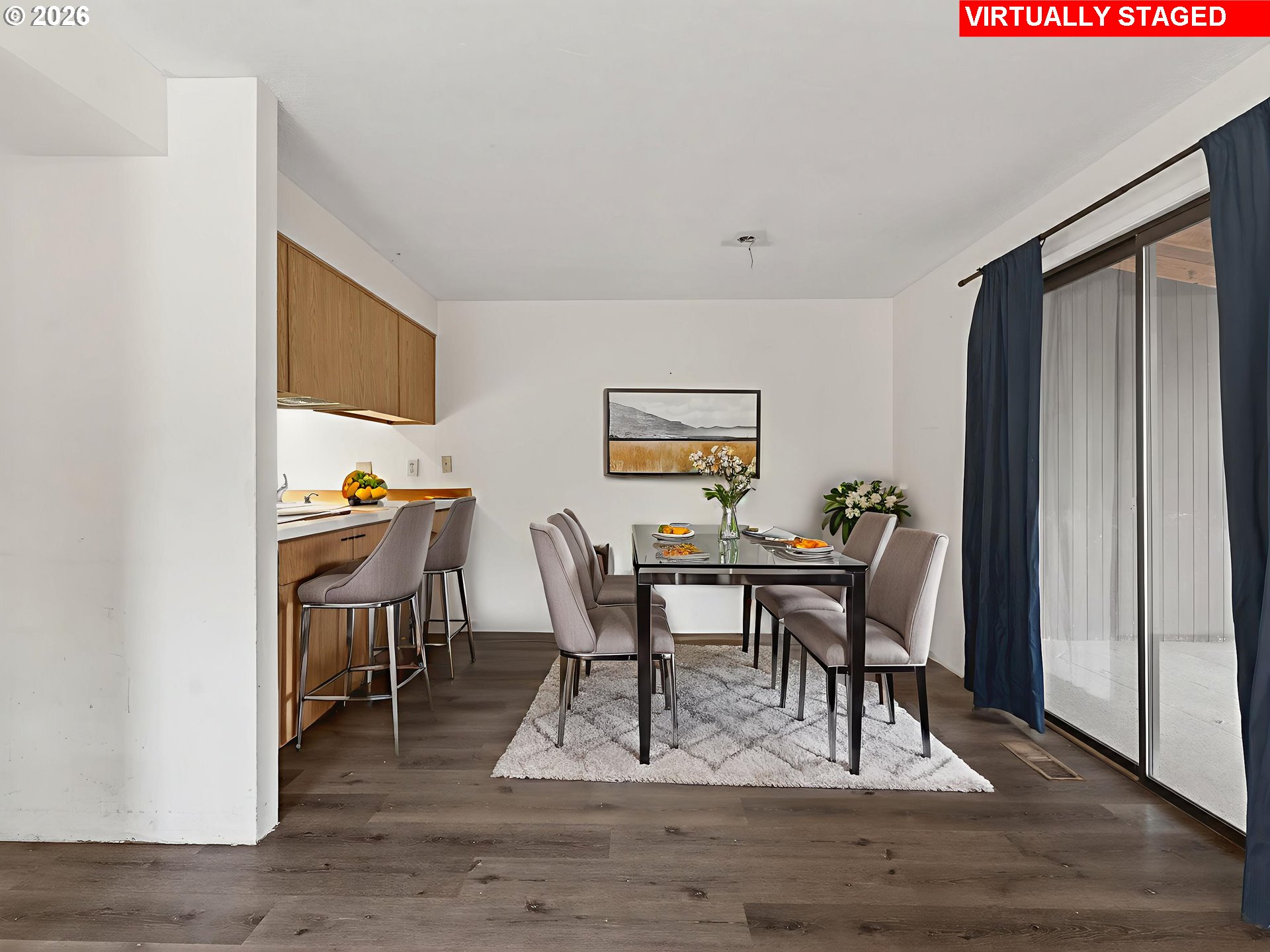 6805 Southwest 180th Avenue Beaverton, OR 97007 - Photo 9 of 29 a view of a dining room with furniture and wooden floor