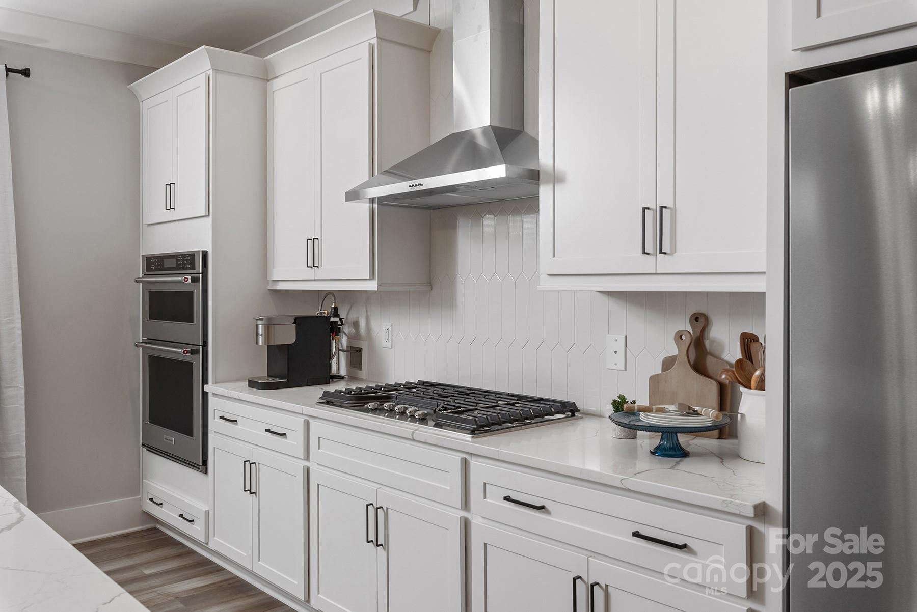 1945 Hendricks Street Rock Hill, SC 29732 - Photo 4 of 19 a kitchen with stainless steel appliances granite countertop a refrigerator and a stove