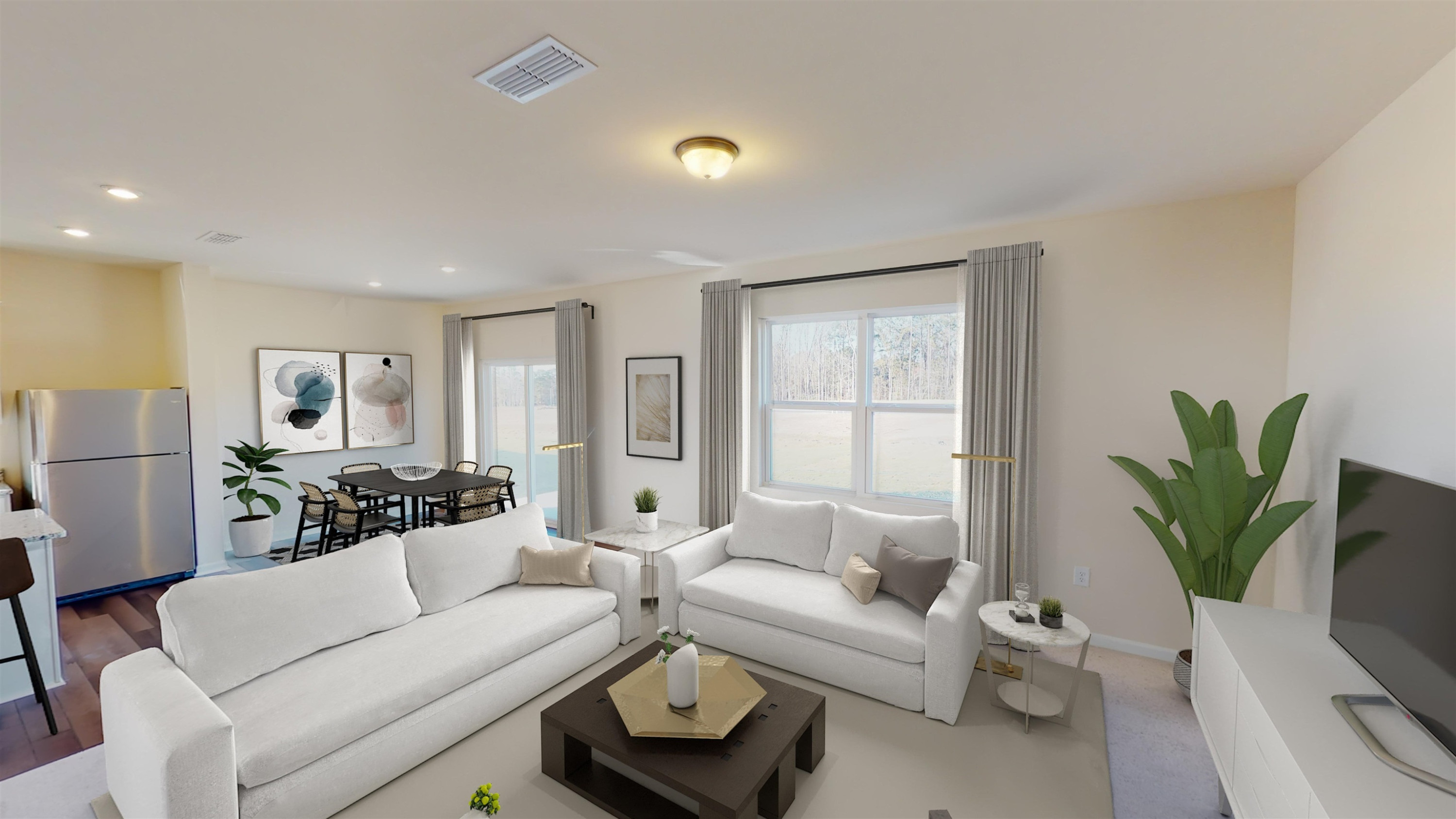 3424 Dragonfly River Raleigh, NC 27604 - Photo 14 of 28 a living room with furniture and a potted plant