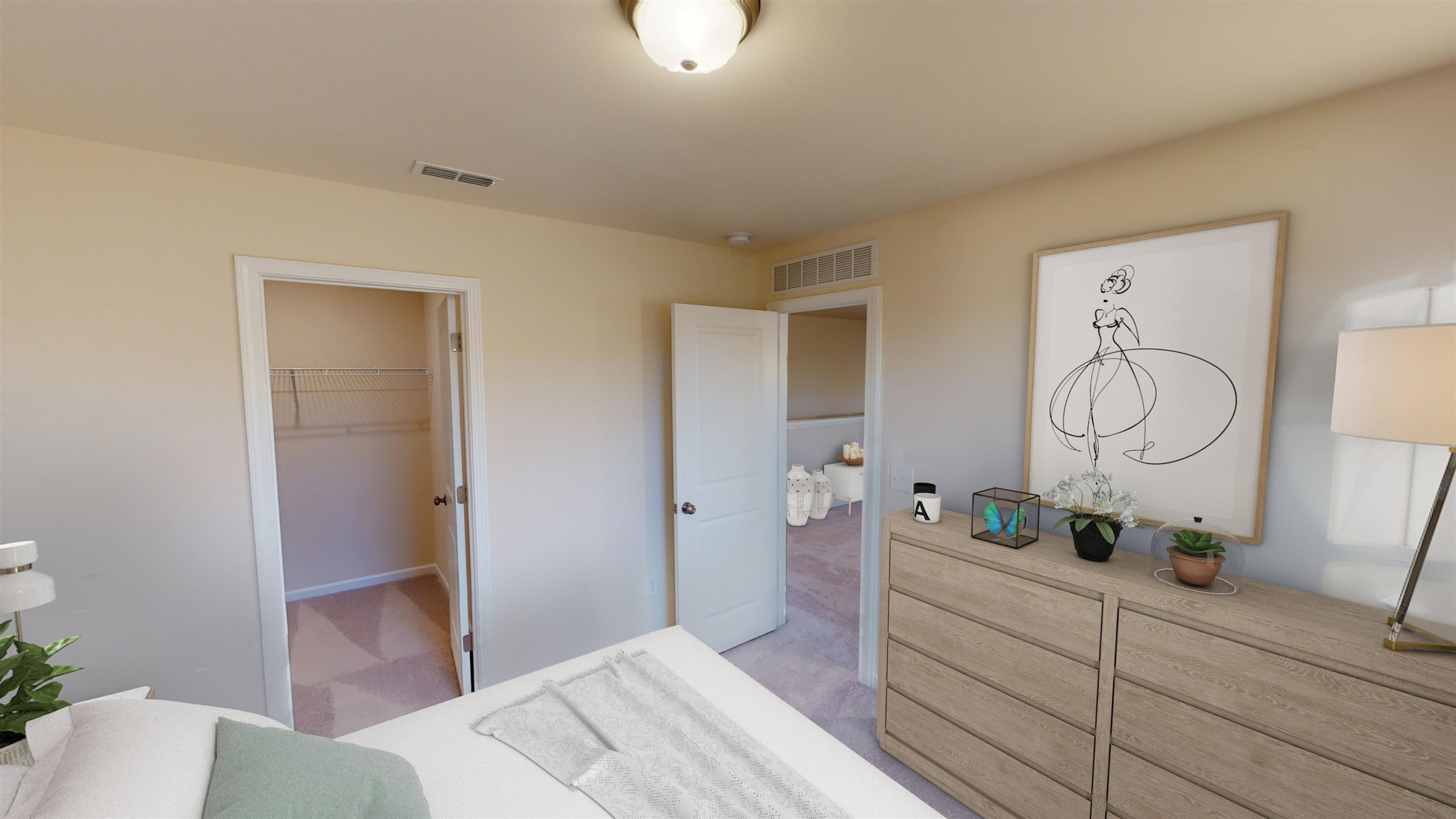 3424 Dragonfly River Raleigh, NC 27604 - Photo 24 of 28 a bedroom with a bed and a dresser