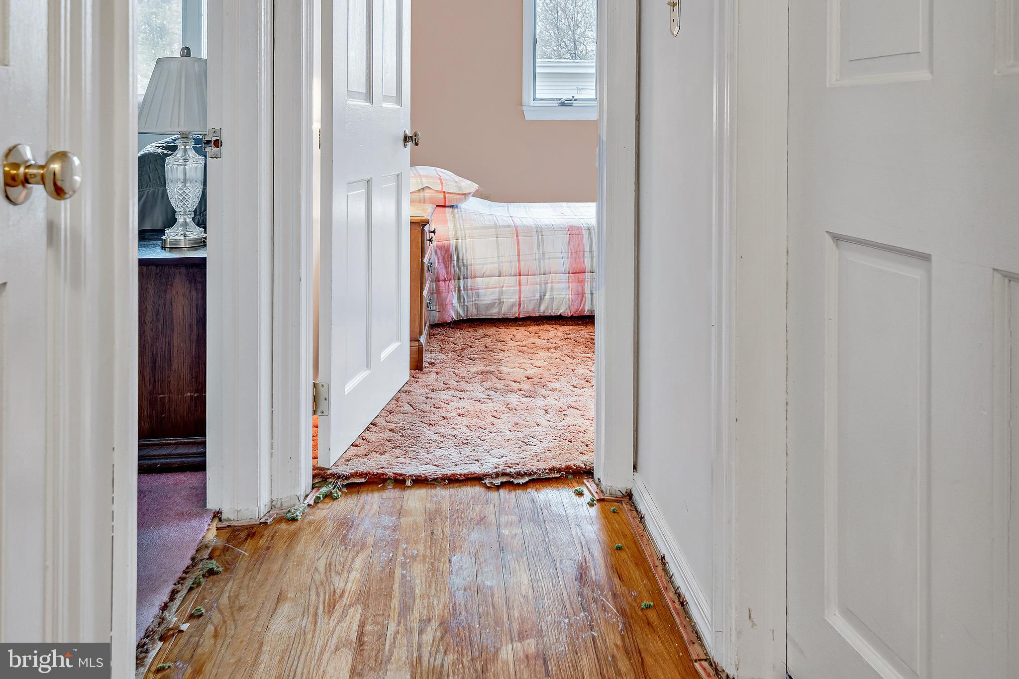4802 Virginia Road Mechanicsburg, PA 17050 - Photo 12 of 30 Hardwood floors preserved under carpet!