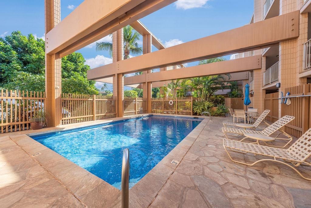 3785 Lower Honoapiilani Road, Unit 208 Lahaina, HI 96761 - Photo 39 of 50 a view of a swimming pool with a patio