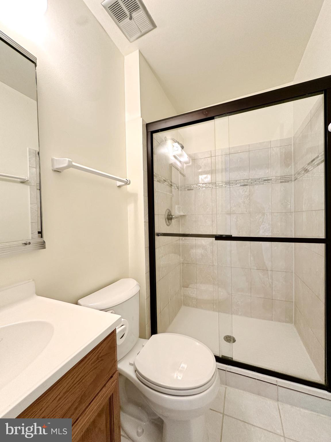 6260 Rathlin Drive Springfield, VA 22152 - Photo 18 of 27 a bathroom with a sink toilet and shower