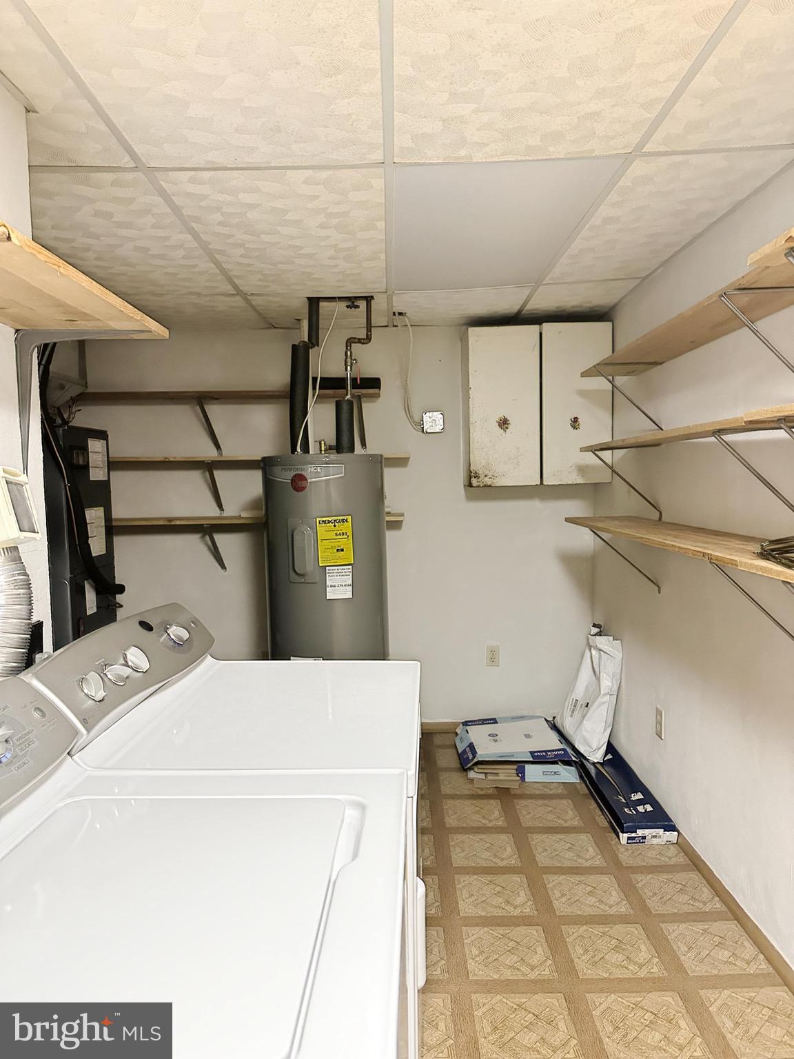 6260 Rathlin Drive Springfield, VA 22152 - Photo 24 of 27 a utility room with dryer and washer