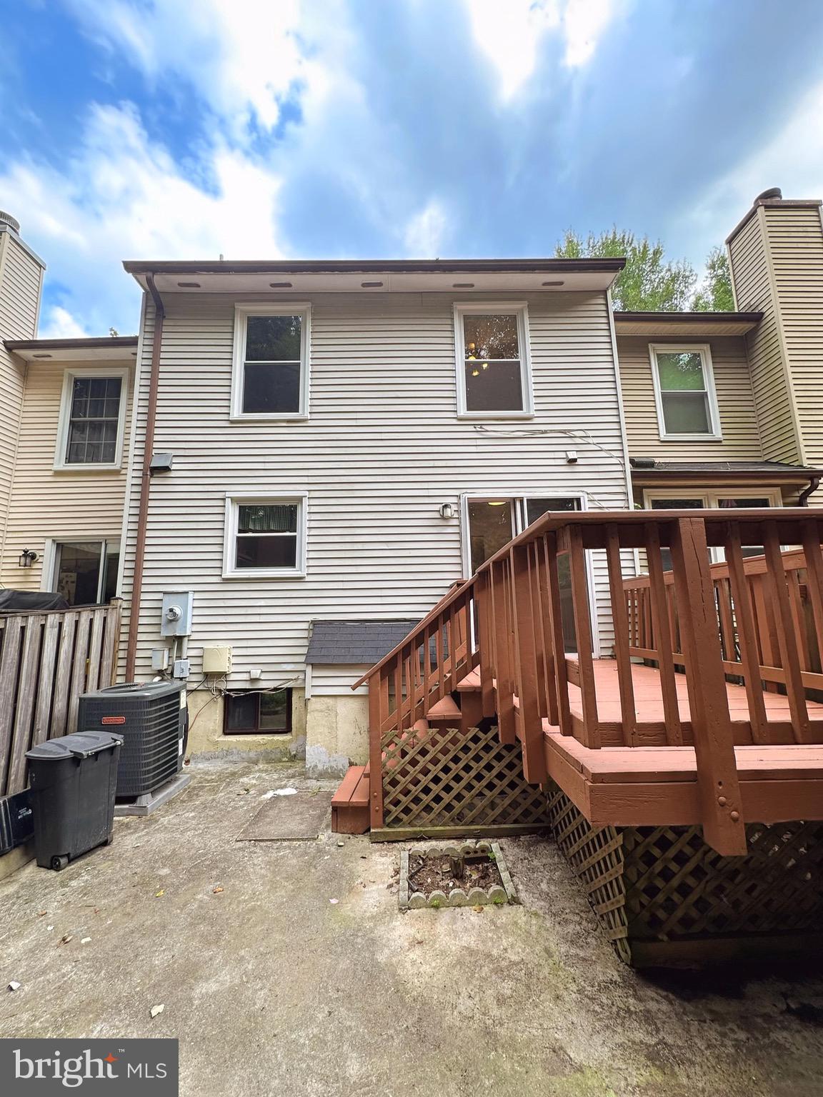 6260 Rathlin Drive Springfield, VA 22152 - Photo 27 of 27 a view of a house with a wooden deck