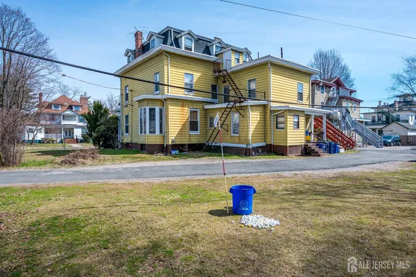 a view of a house with a swimming pool