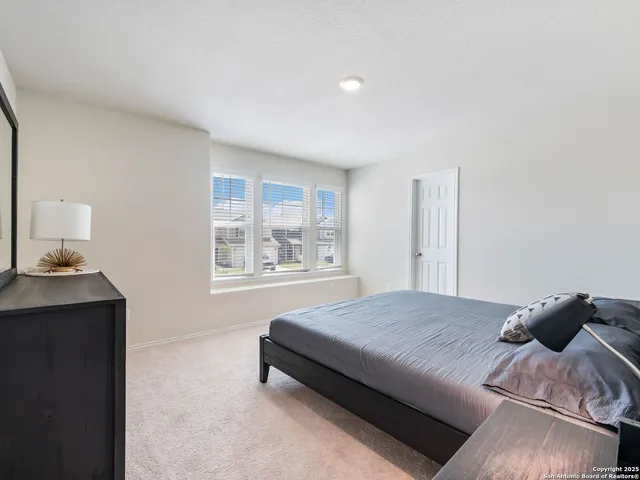 a bathroom with a toilet a sink and a bathtub
