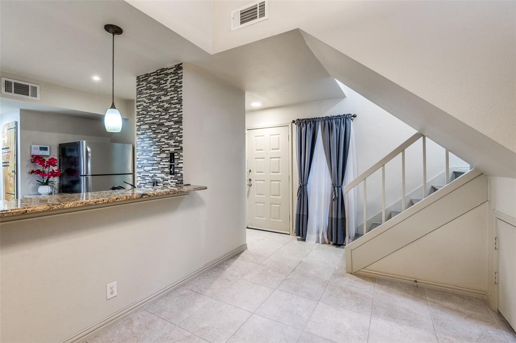 18240 Midway Road, Unit 1704 Dallas, TX 75287 - Photo 12 of 25 a view of entryway and hall
