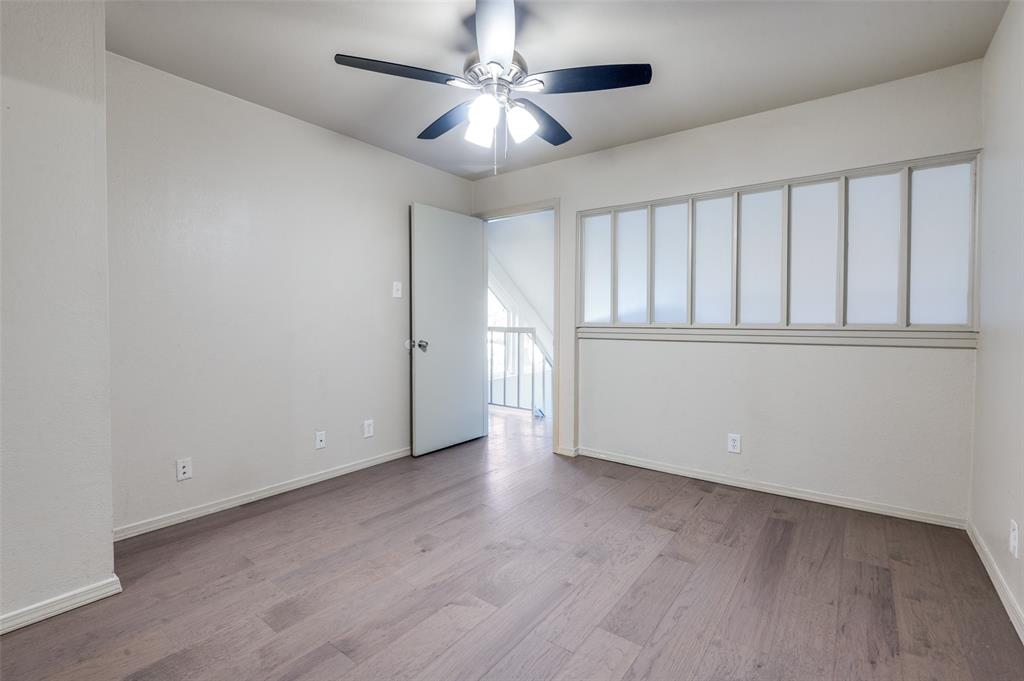 18240 Midway Road, Unit 1704 Dallas, TX 75287 - Photo 14 of 25 wooden floor in an empty room
