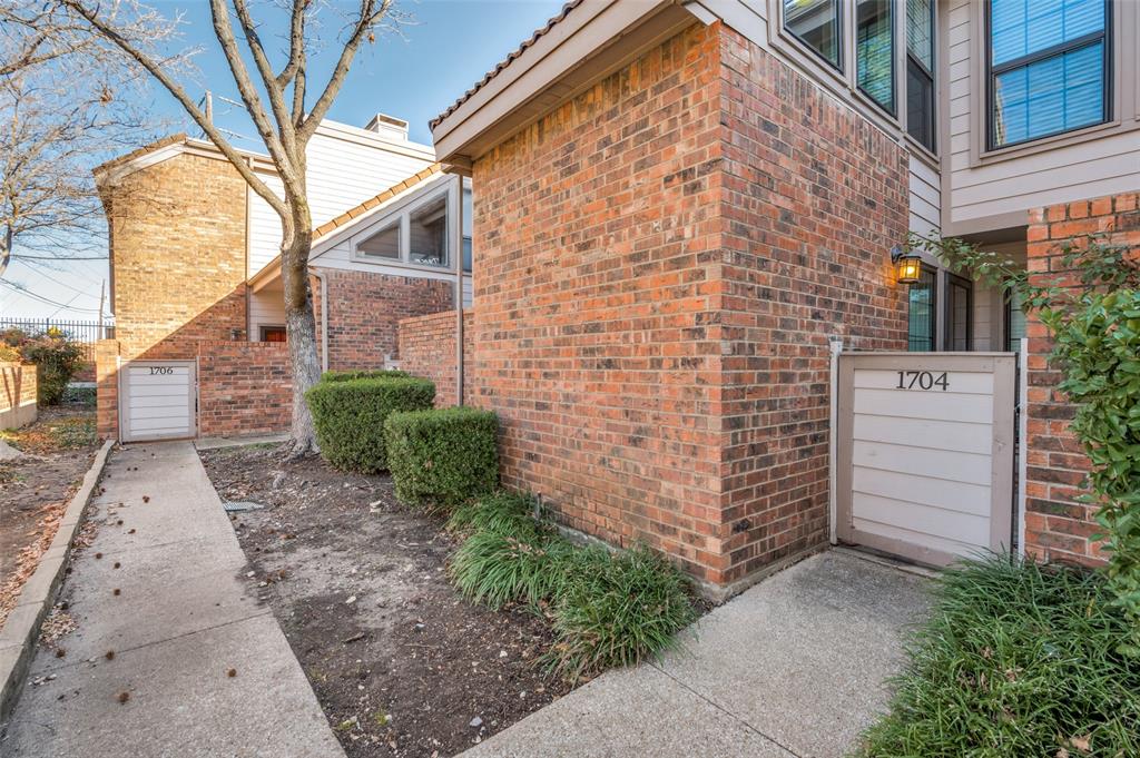 18240 Midway Road, Unit 1704 Dallas, TX 75287 - Photo 2 of 25 a view of a pathway both side of building