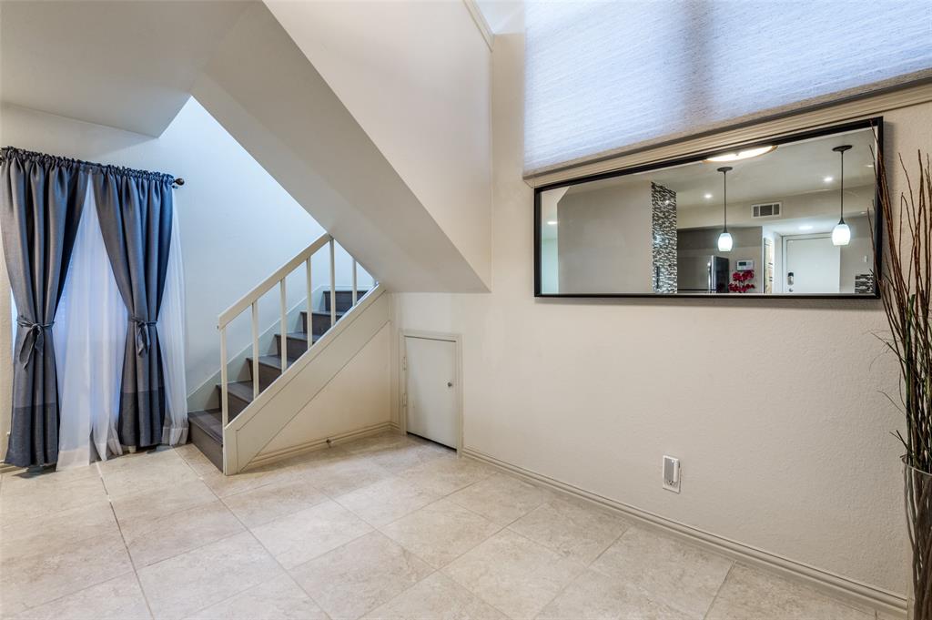 18240 Midway Road, Unit 1704 Dallas, TX 75287 - Photo 5 of 25 a view of staircase with hallway and stairs