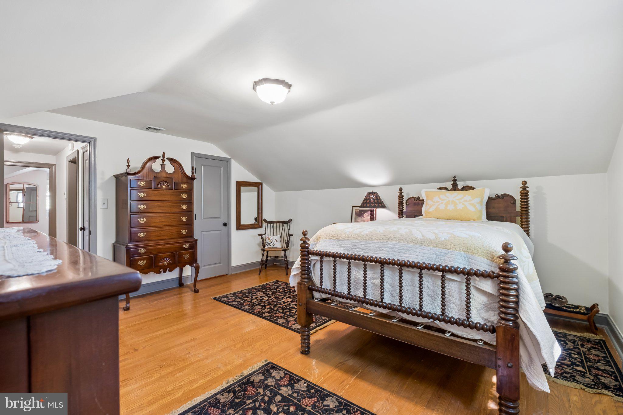 713 Alene Road Ambler, PA 19002 - Photo 22 of 40 a bedroom with furniture and wooden floor