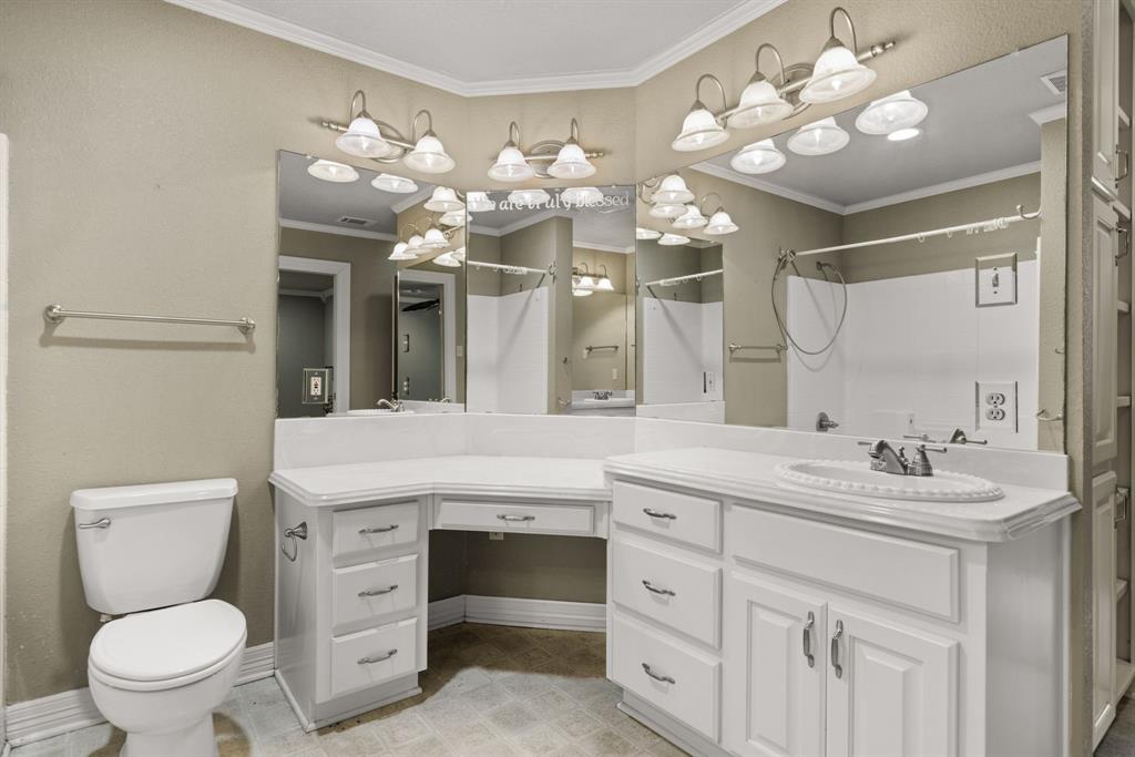 13539 Chapel Road Lorena, TX 76655 - Photo 18 of 37 Bathroom featuring a double vanity, makeup desk, extensive mirror, and overhead lighting