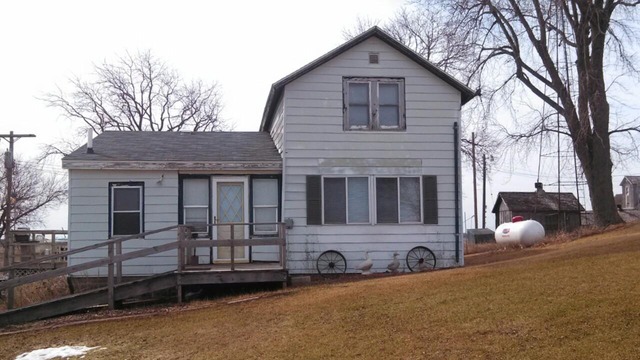 28189 Yonk Road Prophetstown, IL 61277 - Photo 2 of 10 a view of a house with a yard and large tree