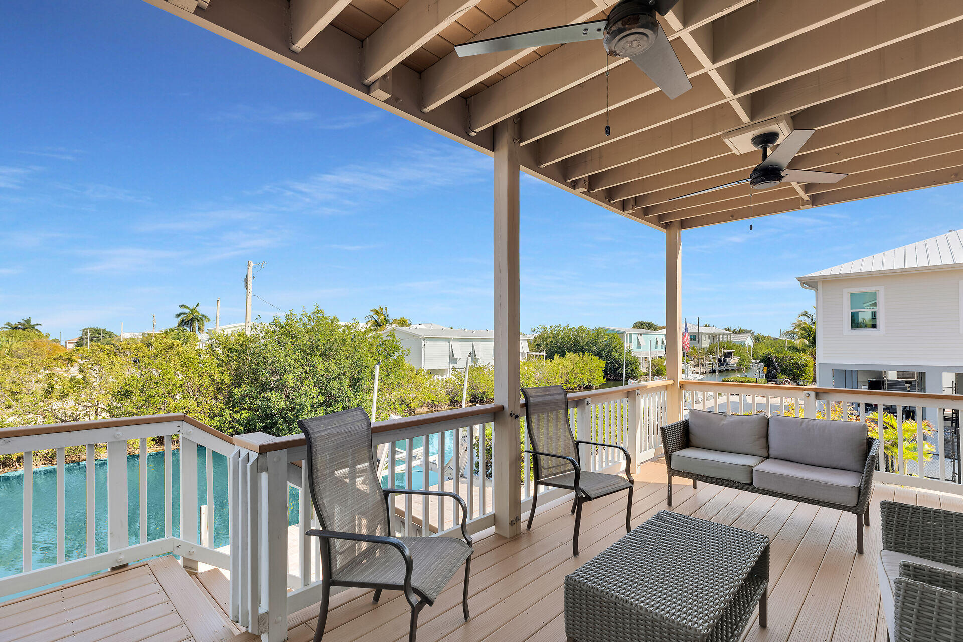 333 Indies Road Summerland Key, FL 33042 - Photo 11 of 66 a view of a balcony with furniture