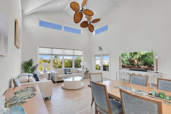 a large kitchen with a large counter top appliances and cabinets