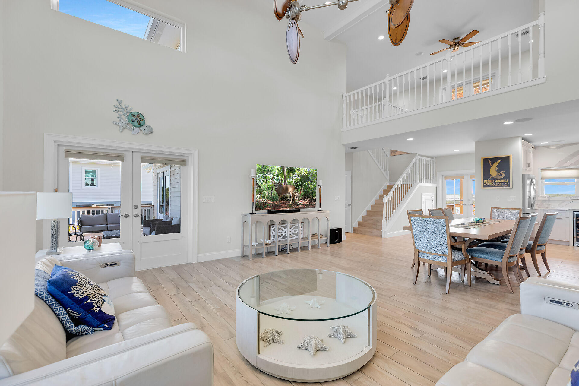 333 Indies Road Summerland Key, FL 33042 - Photo 18 of 66 a living room with furniture and a wooden floor
