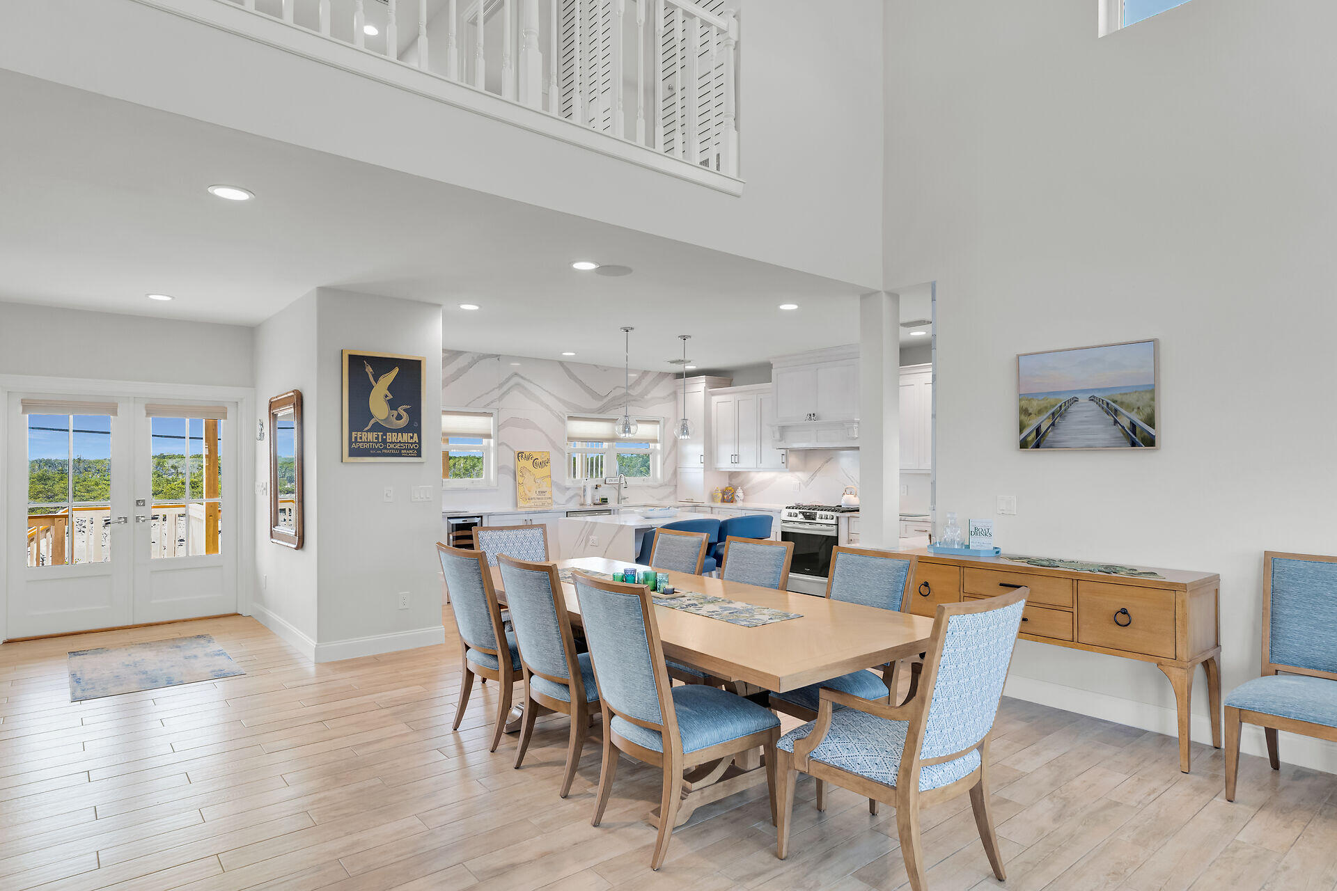 333 Indies Road Summerland Key, FL 33042 - Photo 19 of 66 a view of a dining room with furniture window and wooden floor