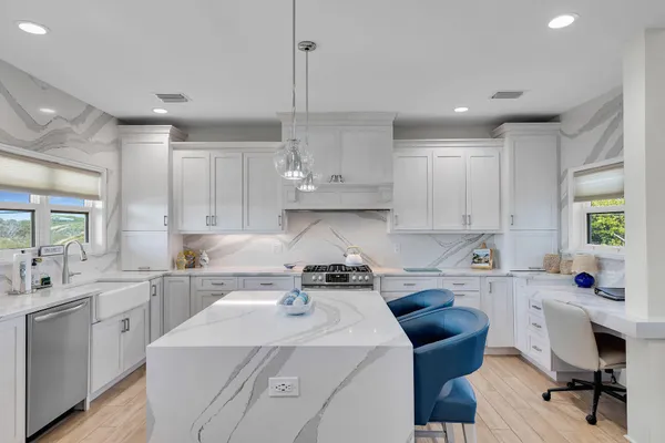 a bathroom with a toilet a sink and a bathtub