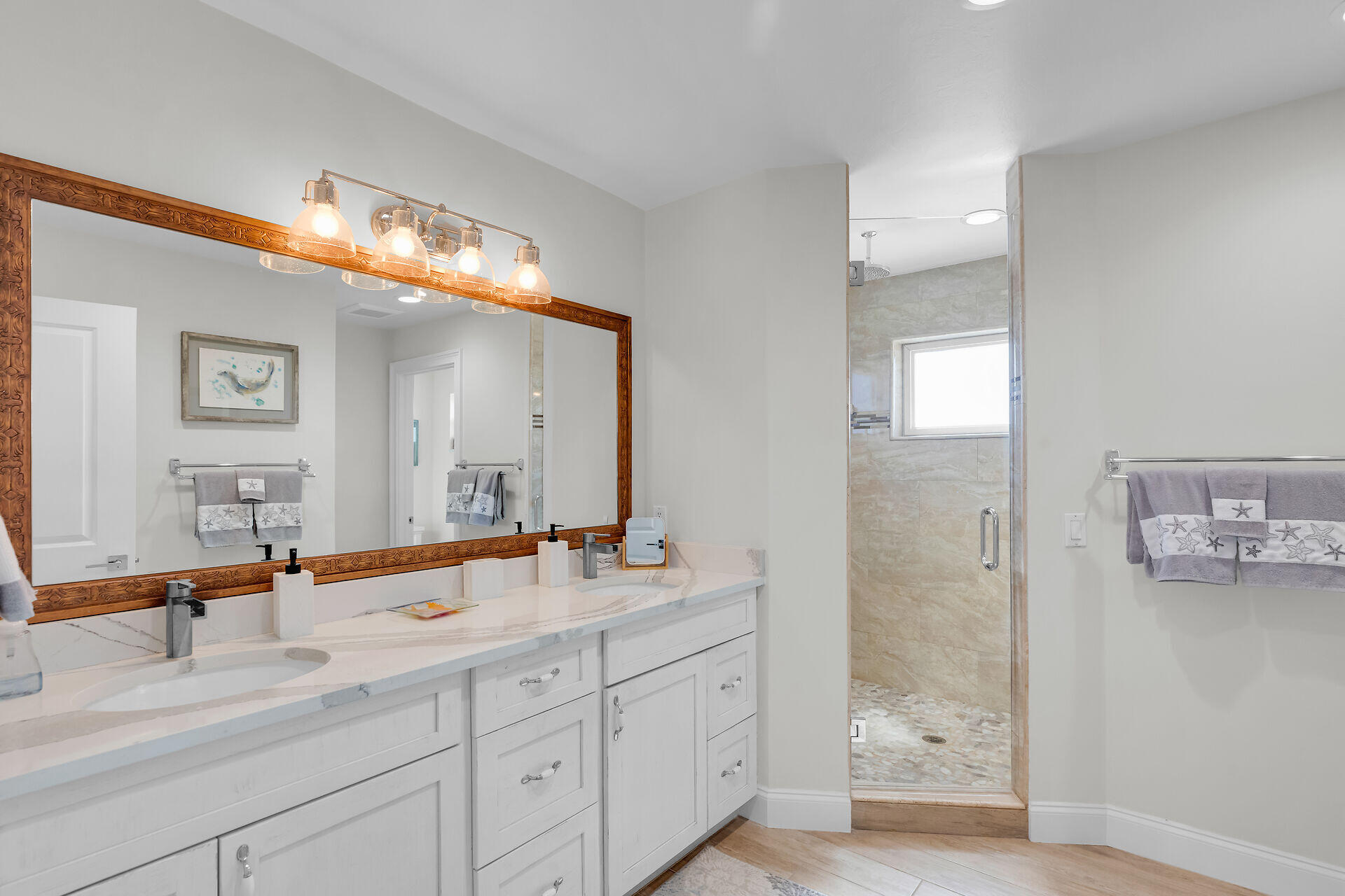 333 Indies Road Summerland Key, FL 33042 - Photo 28 of 66 a bathroom with double vanity sink and a mirror