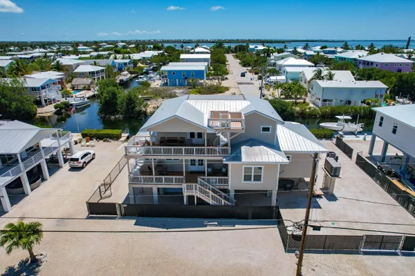 an aerial view of a house with balcony