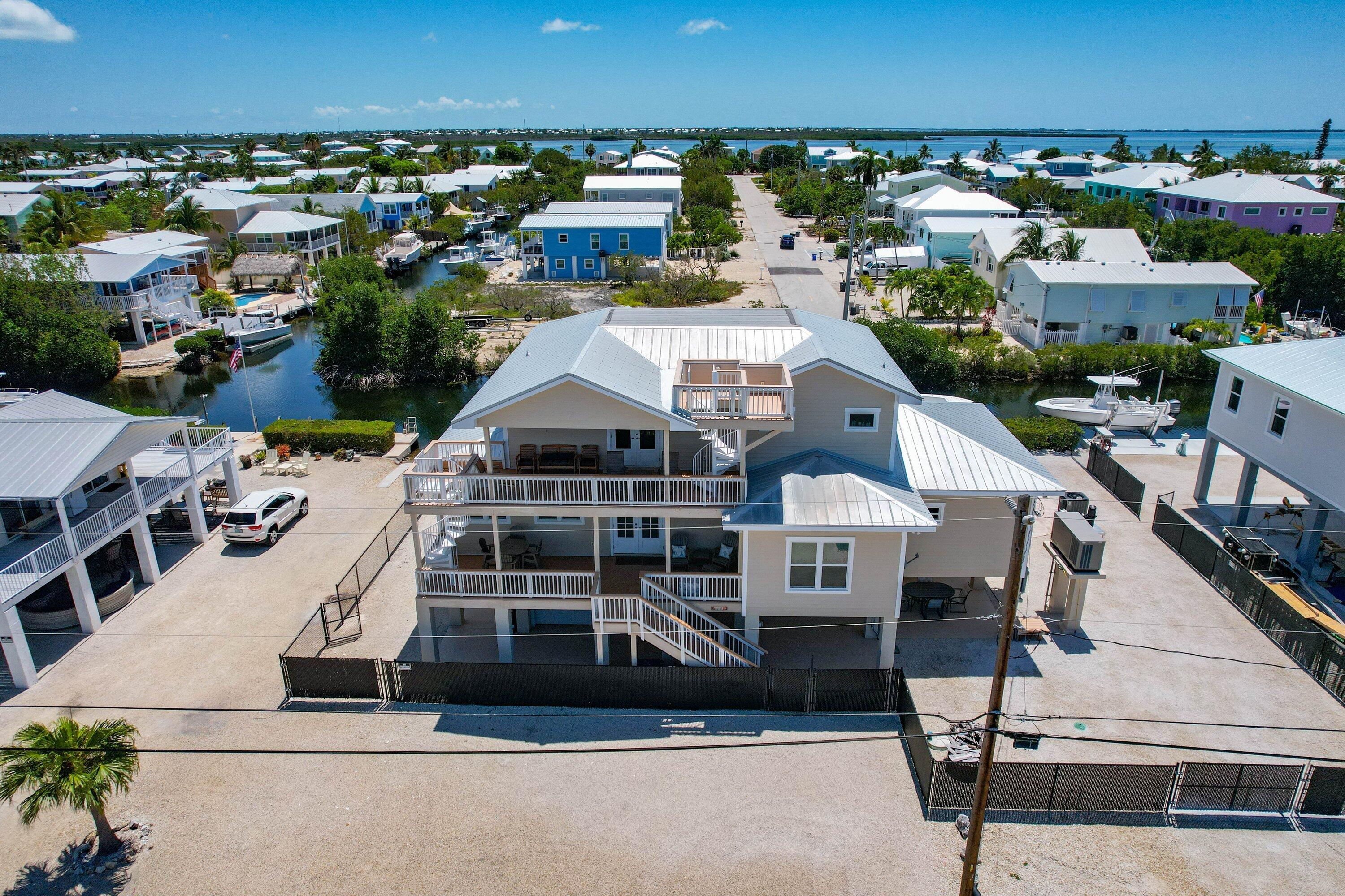 333 Indies Road Summerland Key, FL 33042 - Photo 3 of 66 an aerial view of a house with a ocean view