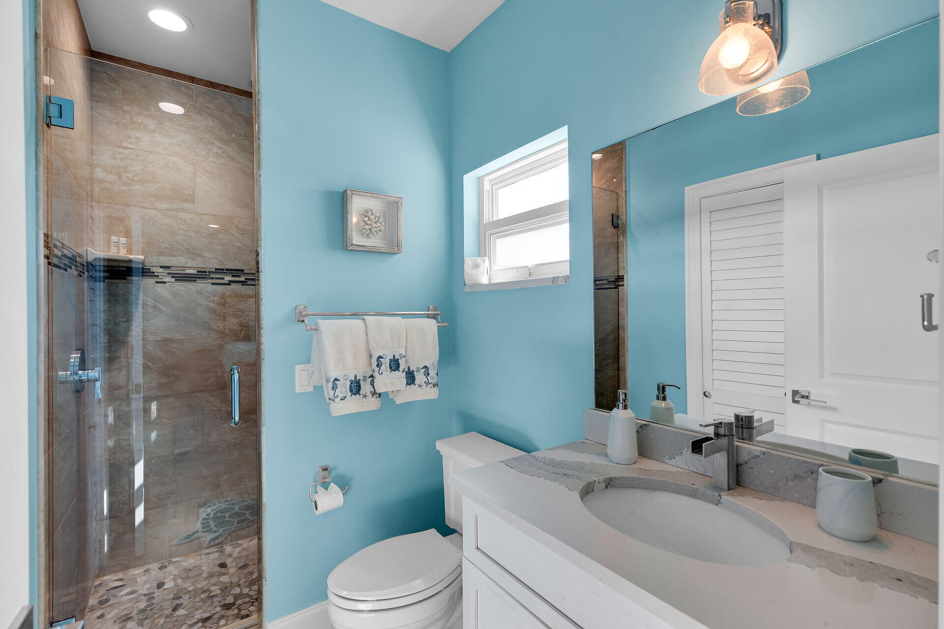 333 Indies Road Summerland Key, FL 33042 - Photo 31 of 66 a bathroom with a sink a toilet and shower