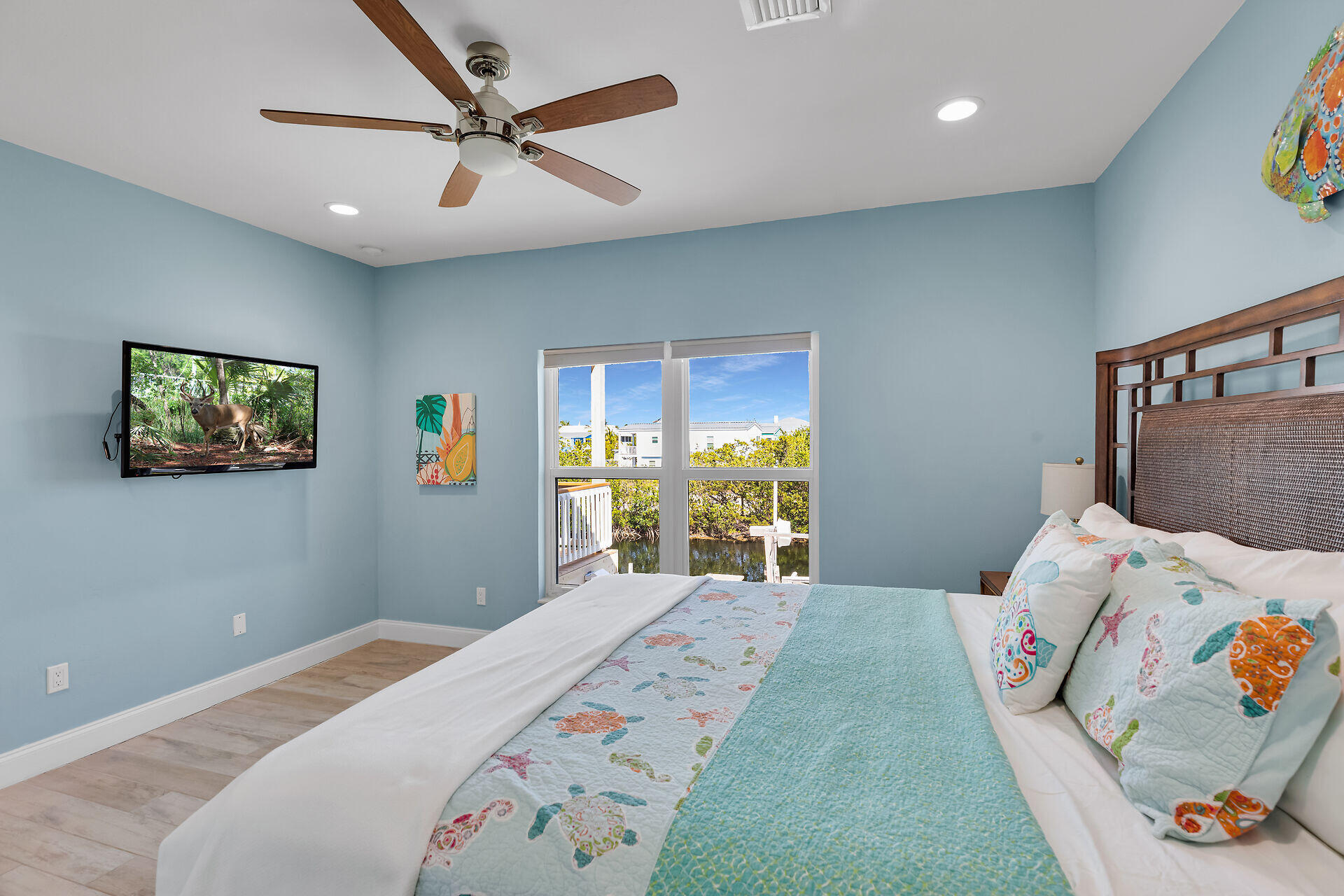 333 Indies Road Summerland Key, FL 33042 - Photo 32 of 66 a bedroom with a bed and a window