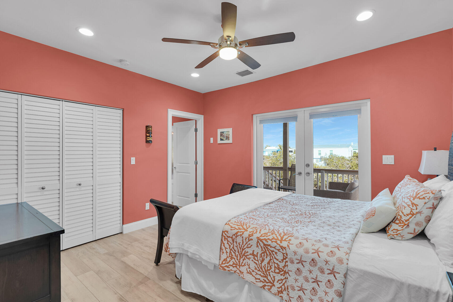 333 Indies Road Summerland Key, FL 33042 - Photo 34 of 66 a bedroom with a bed and a chandelier