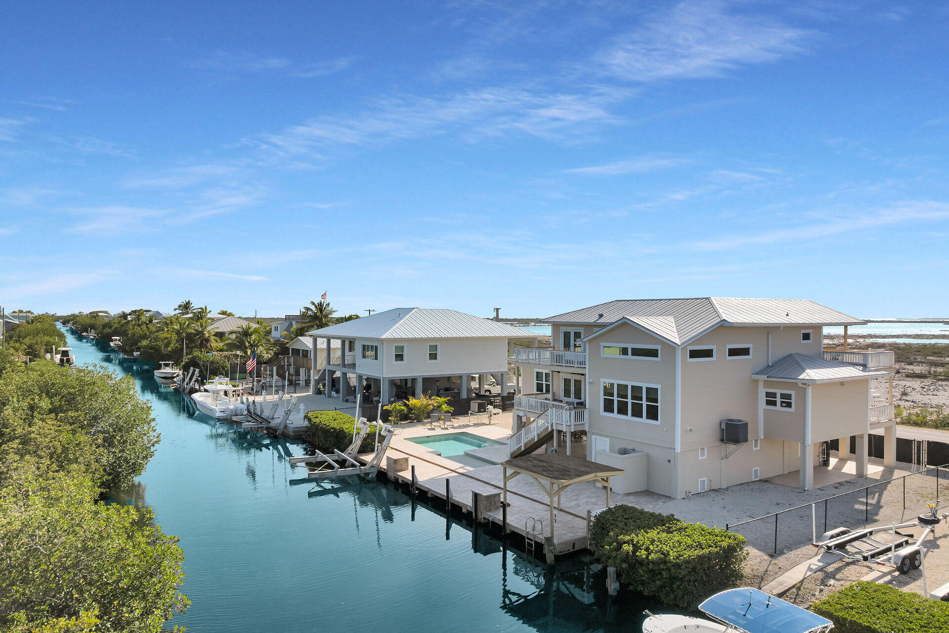 333 Indies Road Summerland Key, FL 33042 - Photo 36 of 66 a view of a lake with a building in the background
