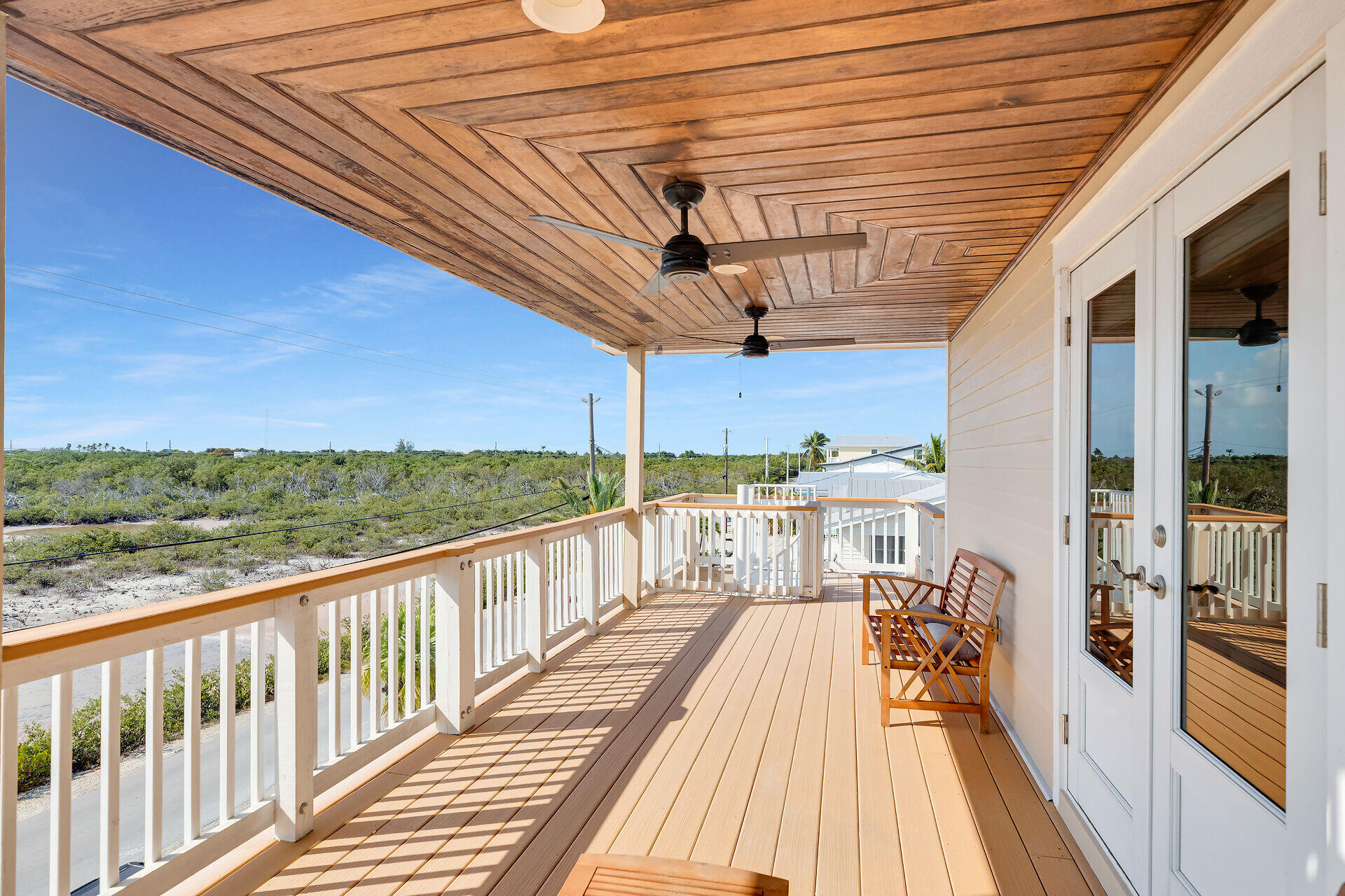 333 Indies Road Summerland Key, FL 33042 - Photo 40 of 66 a view of a balcony with wooden floor