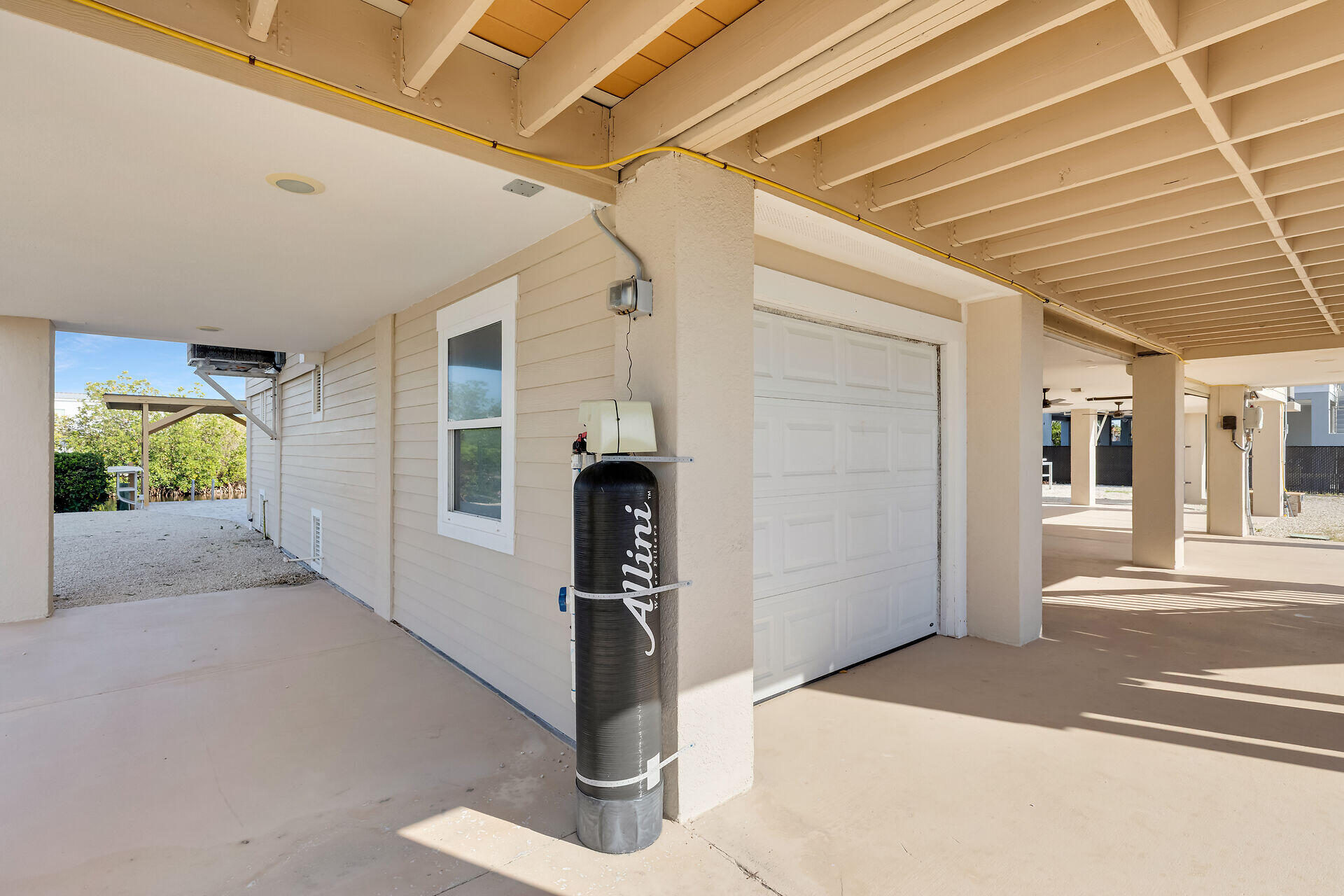 333 Indies Road Summerland Key, FL 33042 - Photo 62 of 66 a front view of a house with a garage