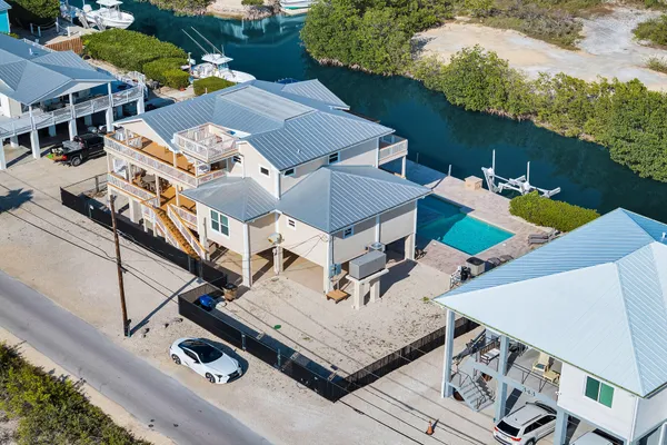 a view of a lake with a house in the background