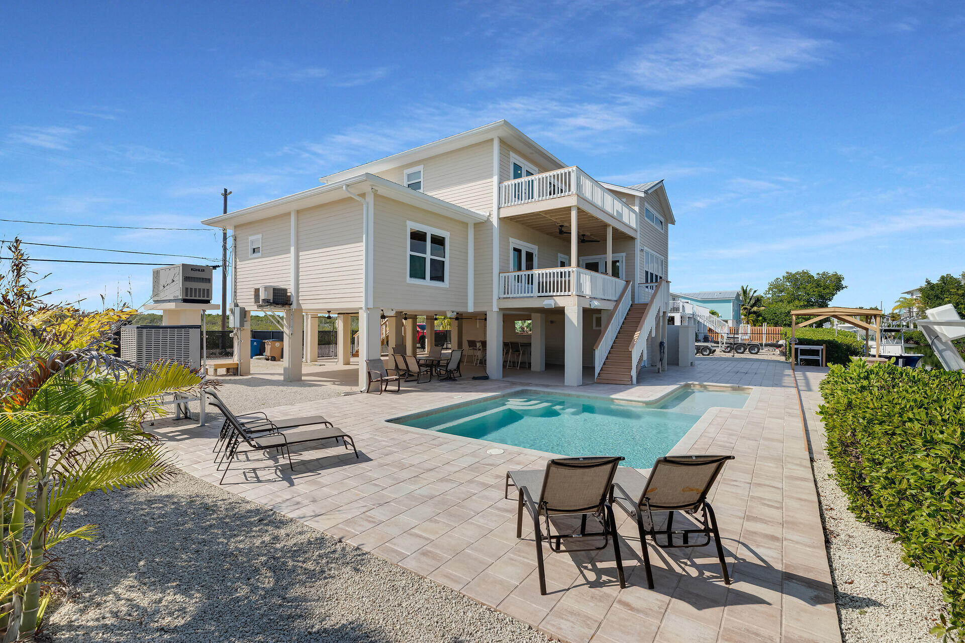 333 Indies Road Summerland Key, FL 33042 - Photo 8 of 66 a view of a house with backyard porch and sitting area