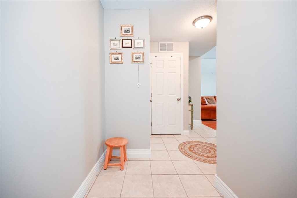 84 Mill Street, Unit 304 Woonsocket, RI 02895 - Photo 17 of 25 wooden floor in a bathroom