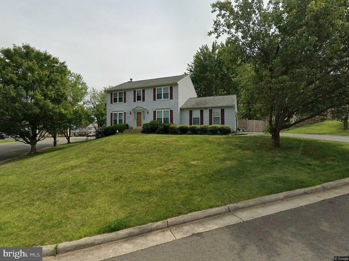 a house view with garden space
