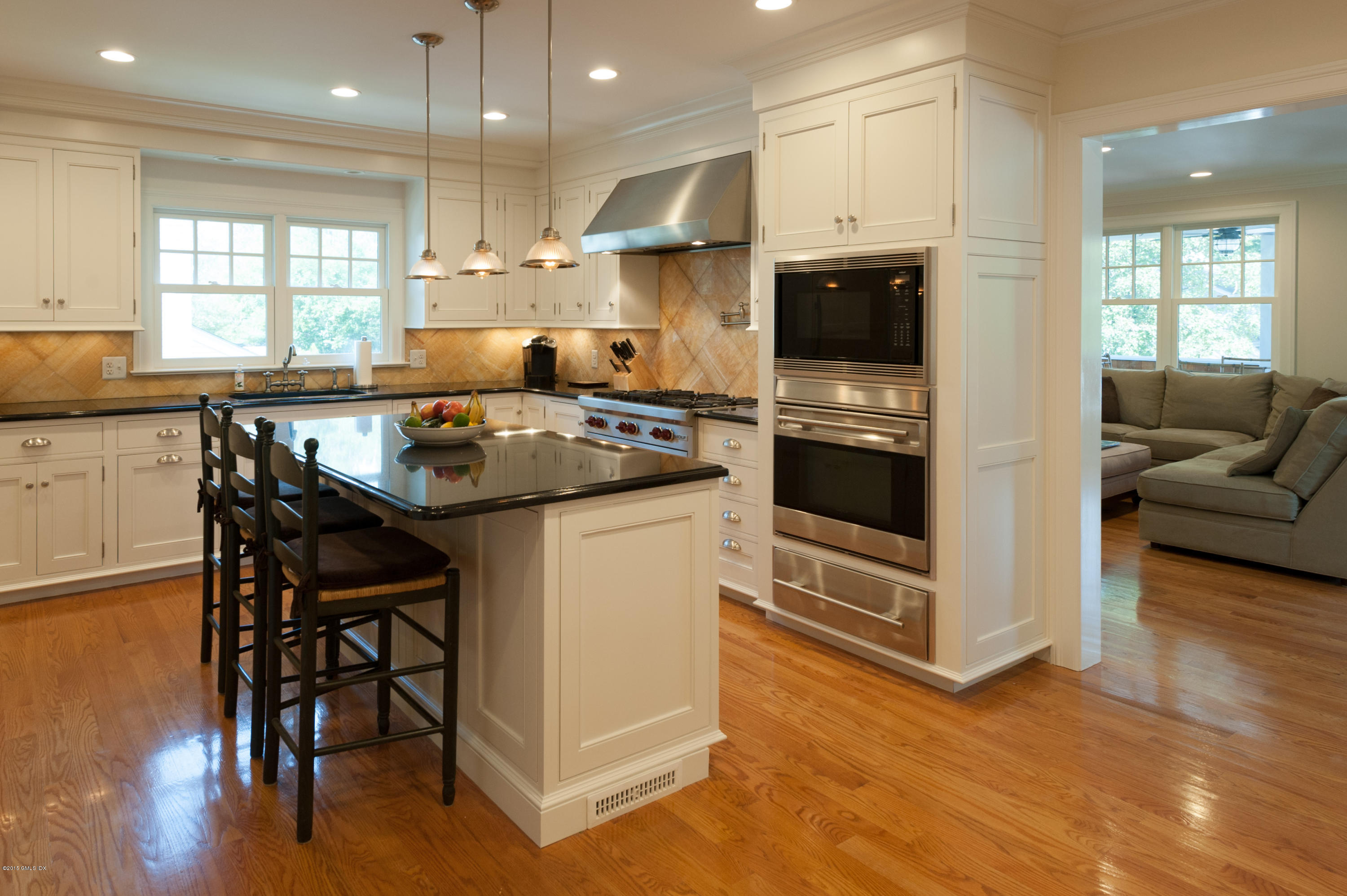 18 Hassake Road Old Greenwich, CT 06870 - Photo 9 of 22 Kitchen into Family Room