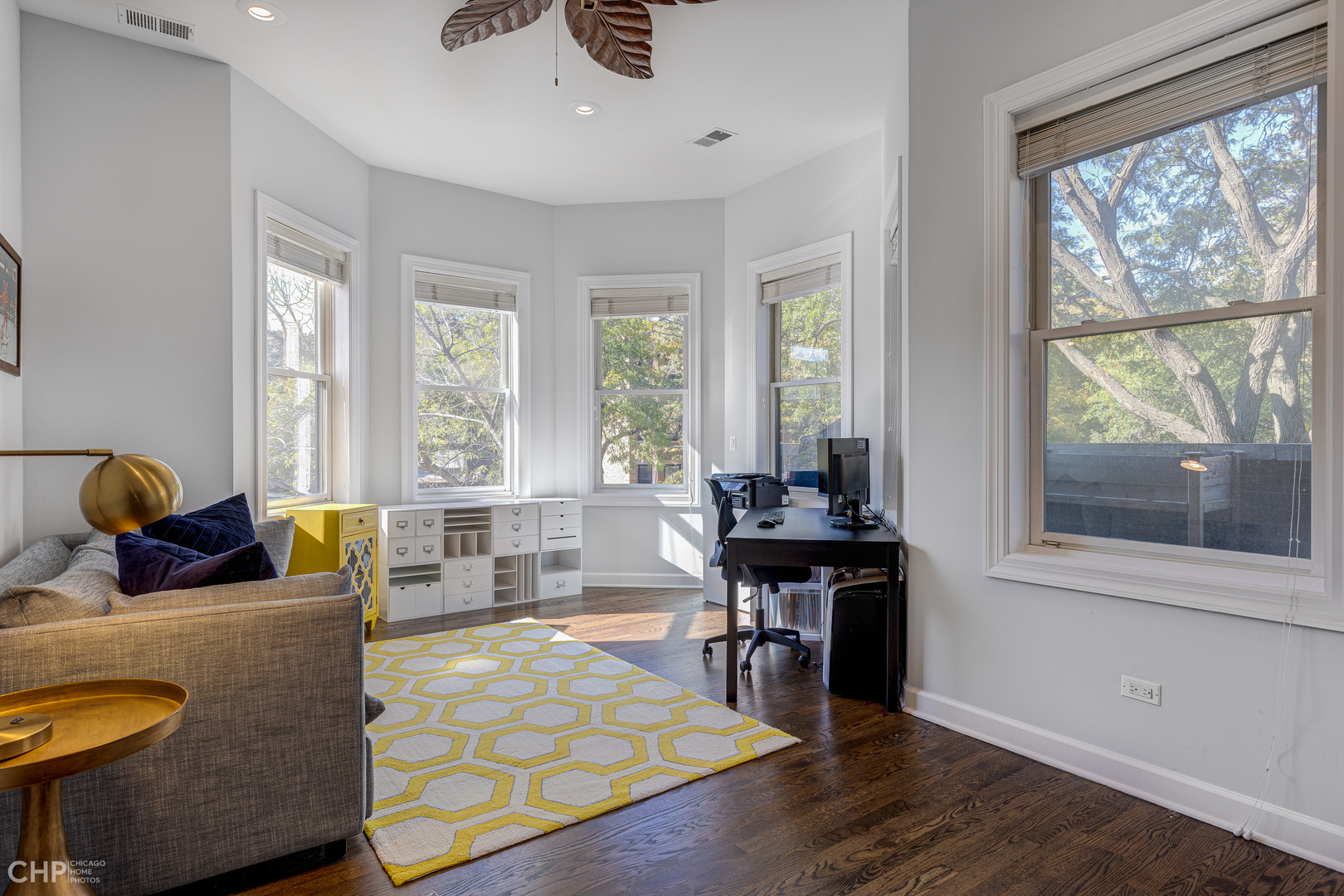 4603 North Racine Avenue, Unit 201 Chicago, IL 60640 - Photo 23 of 33 a living room with furniture and large windows