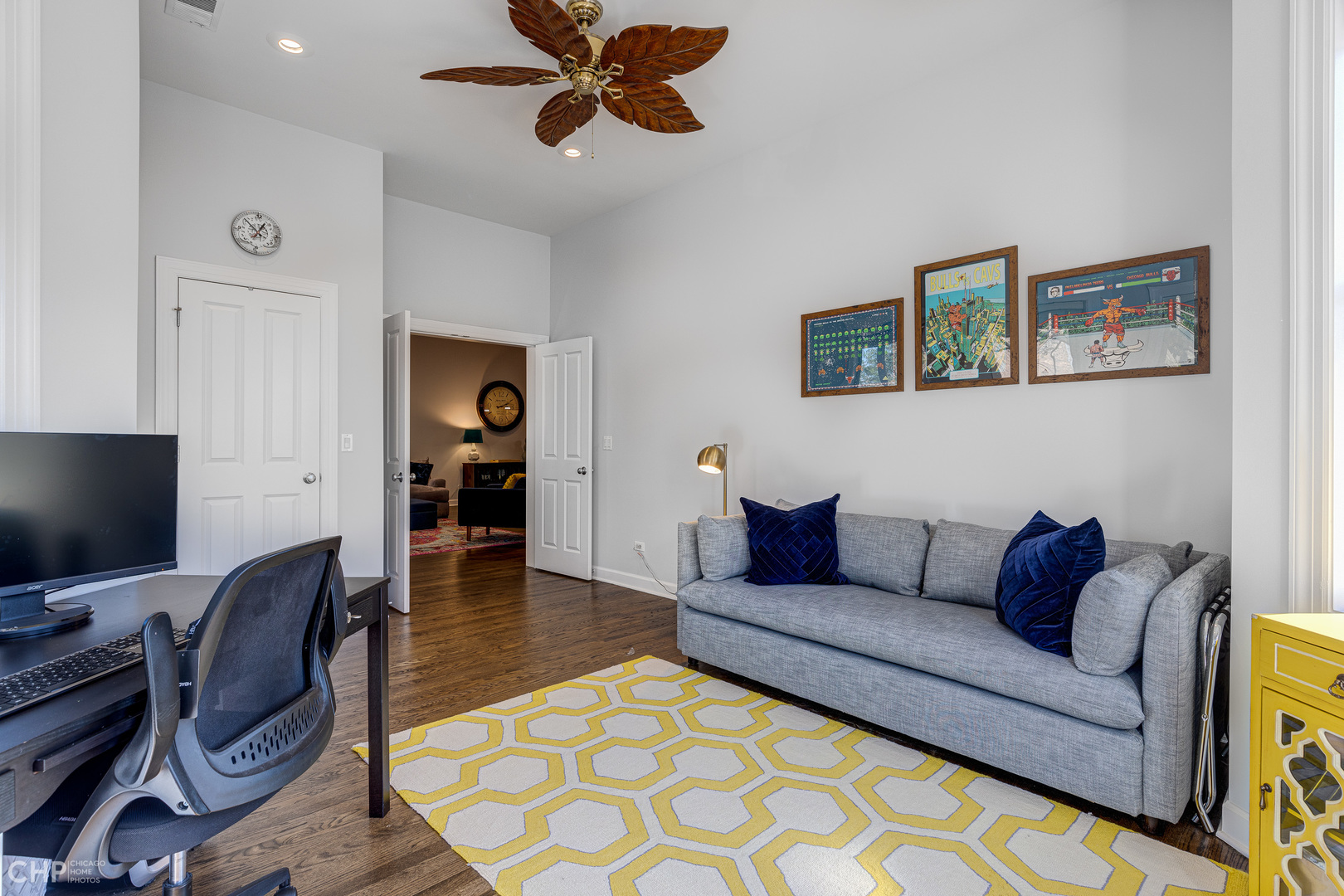 4603 North Racine Avenue, Unit 201 Chicago, IL 60640 - Photo 24 of 33 a living room with furniture and a flat screen tv