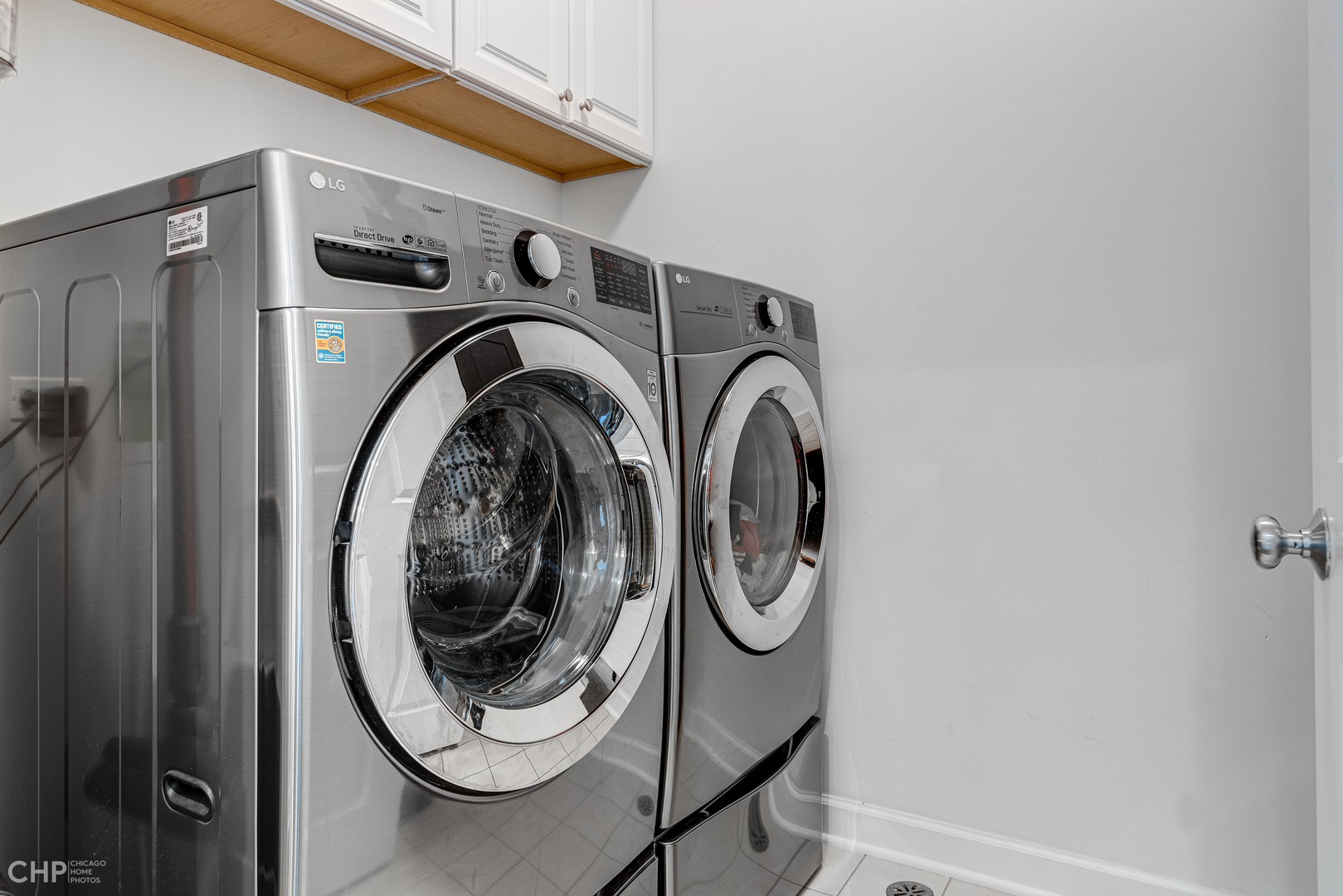 4603 North Racine Avenue, Unit 201 Chicago, IL 60640 - Photo 25 of 33 a utility room with dryer and washer