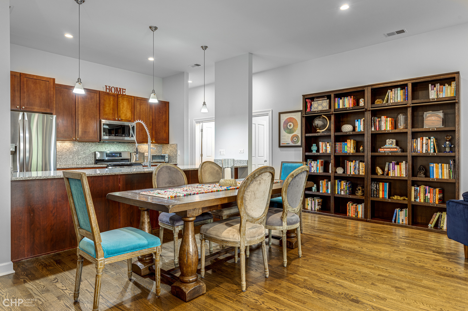 4603 North Racine Avenue, Unit 201 Chicago, IL 60640 - Photo 6 of 33 a dining room with furniture and wooden floor